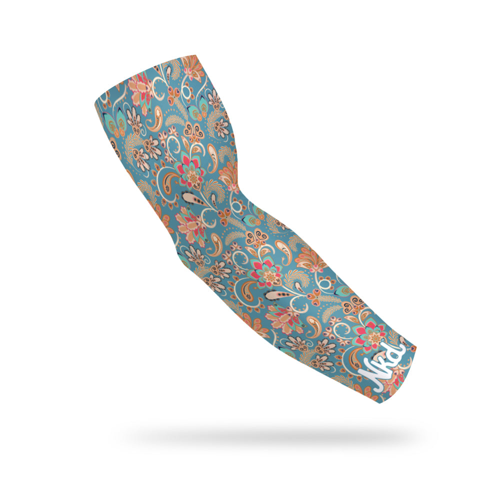 Photo of a light blue arm sleeve decorated with a colorful paisley pattern floating on a white background.