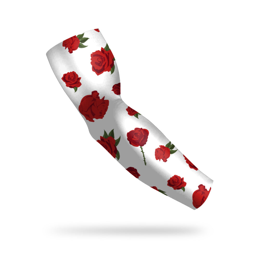 Photo of a white compression sleeve decorated with roses on a white background.