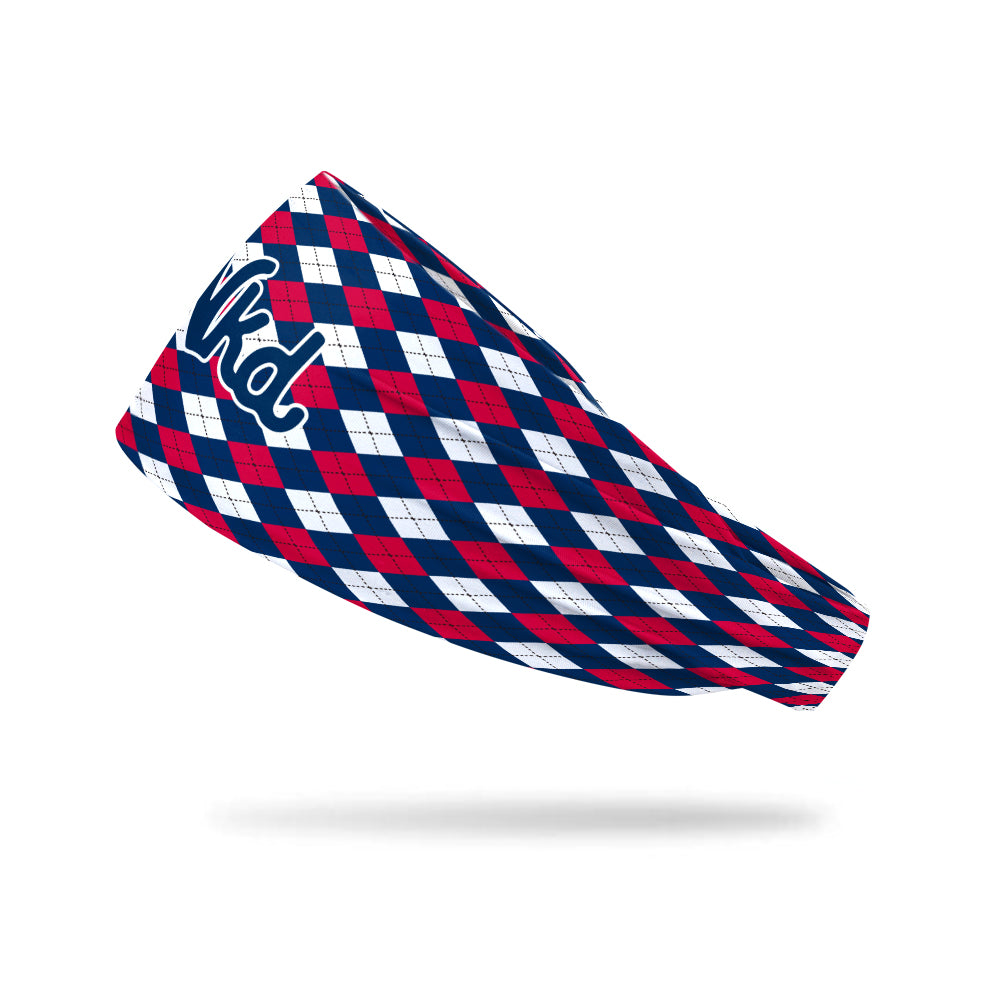 Photo of a white headband with a red and blue plaid design on a white background.