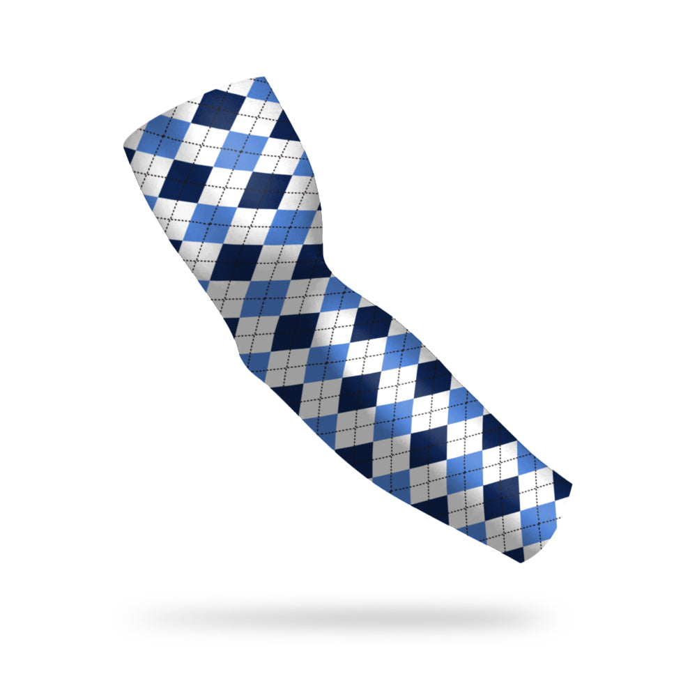 Photo of a white compression sleeve with a plaid dark blue and light blue pattern on a white background. 