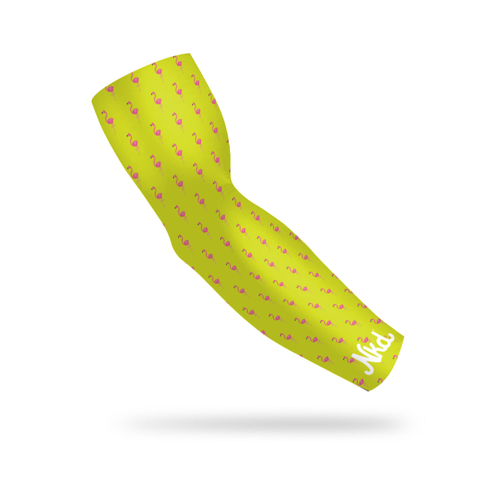 Photo of a neon yellow compression sleeve with a pink flamingo pattern floating on a white background.