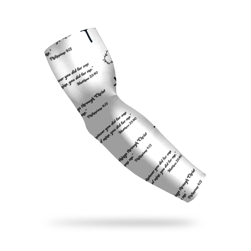 Photo of a white armband with black text applied as a pattern on it on a white background.