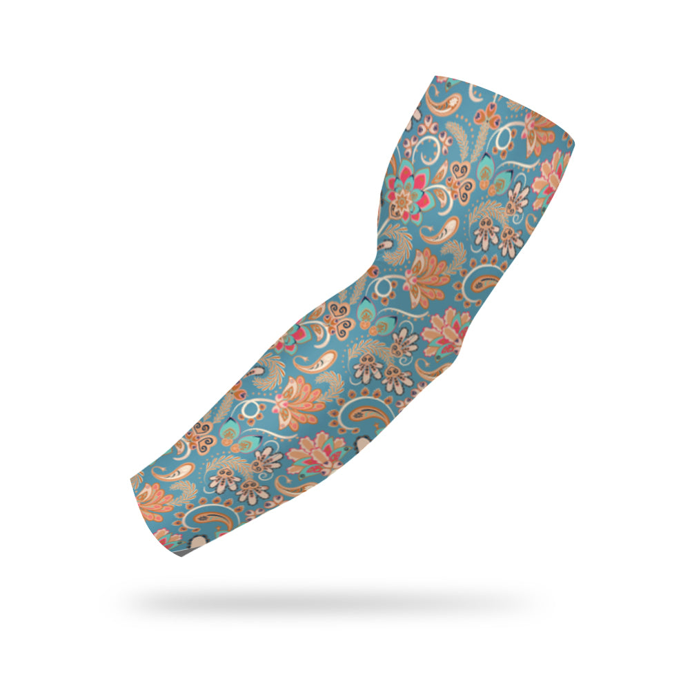 Photo of a light blue arm sleeve decorated with a colorful paisley pattern floating on a white background.